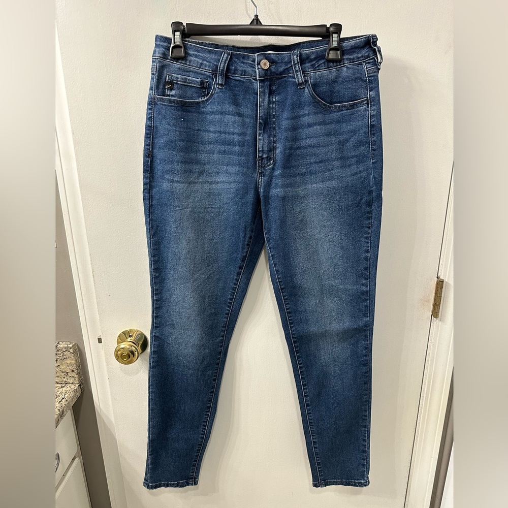 Size 11 (basically size 12) Kancan blue jeans. Never worn.